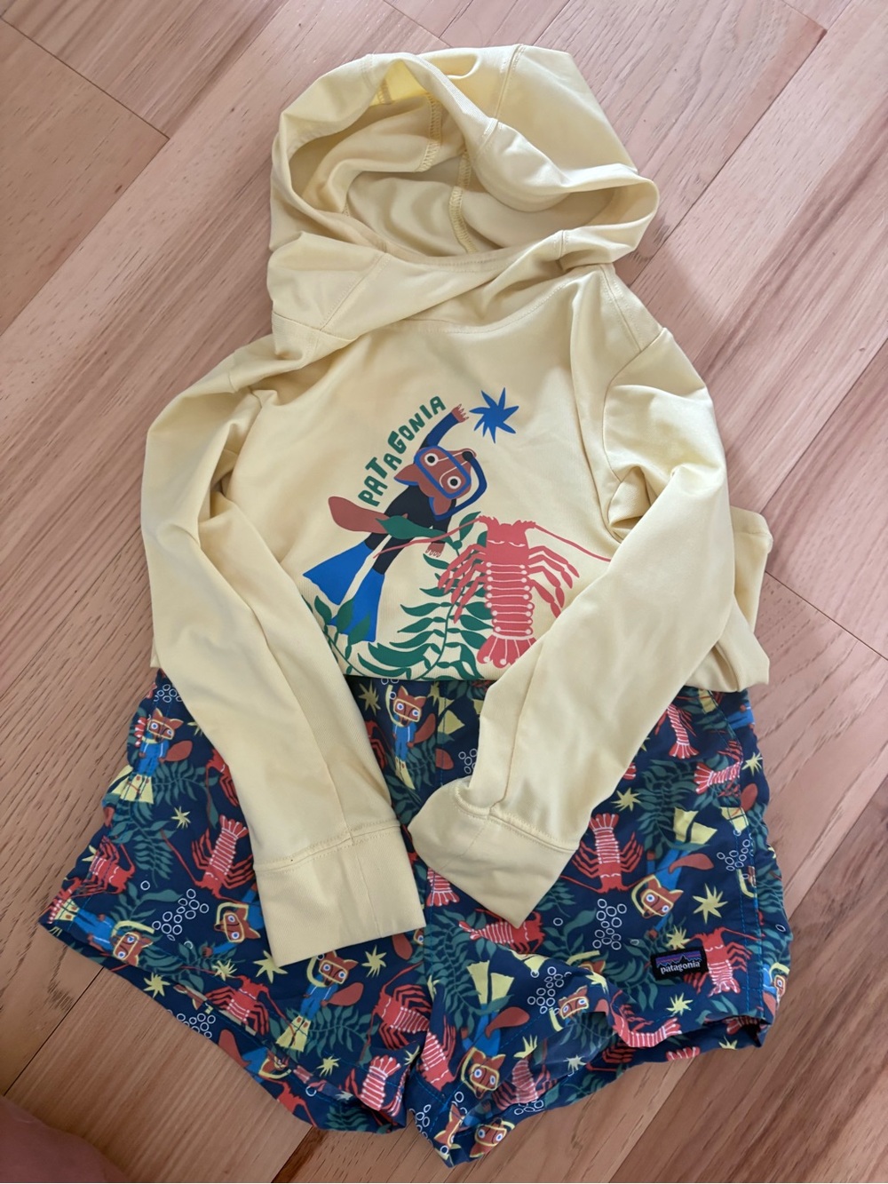 Patagonia Kids Pale Yellow Hooded Shirt with Ocean Graphic